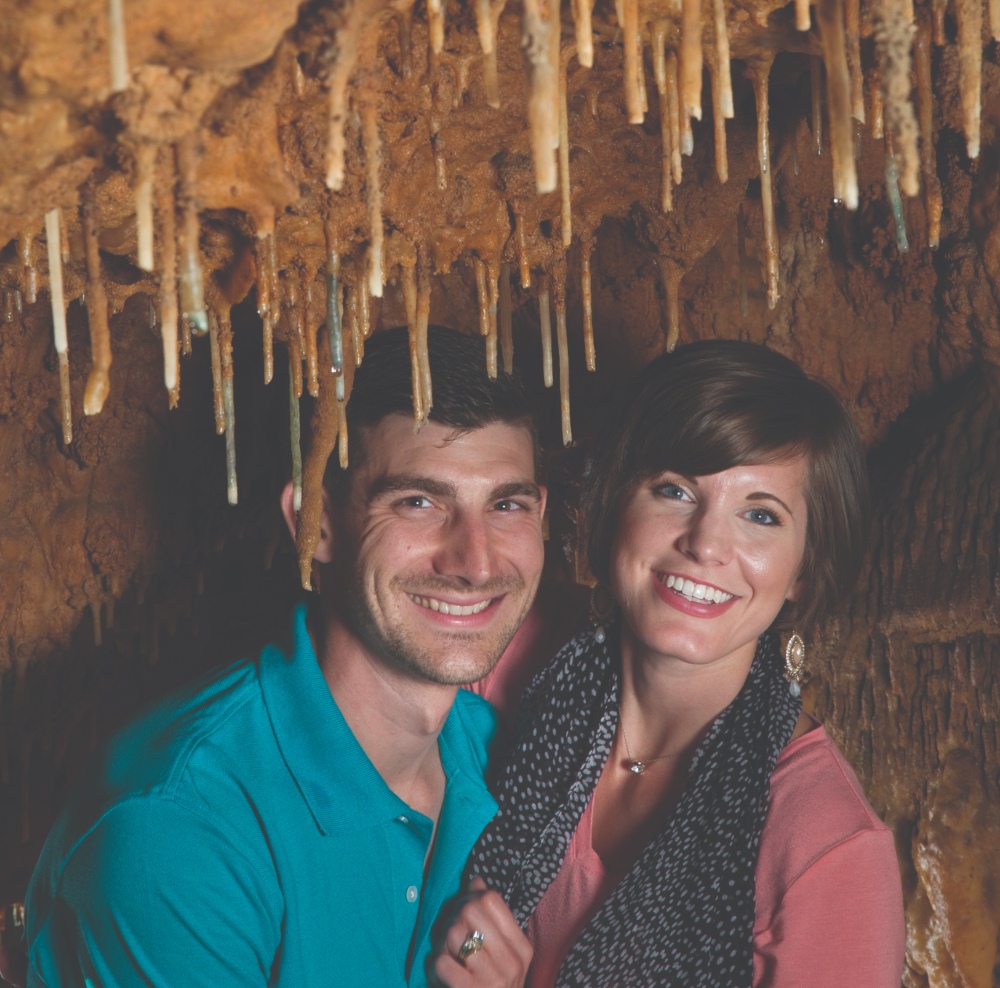 Couple in Talking Rocks Cavern as part of their cheap Branson vacation